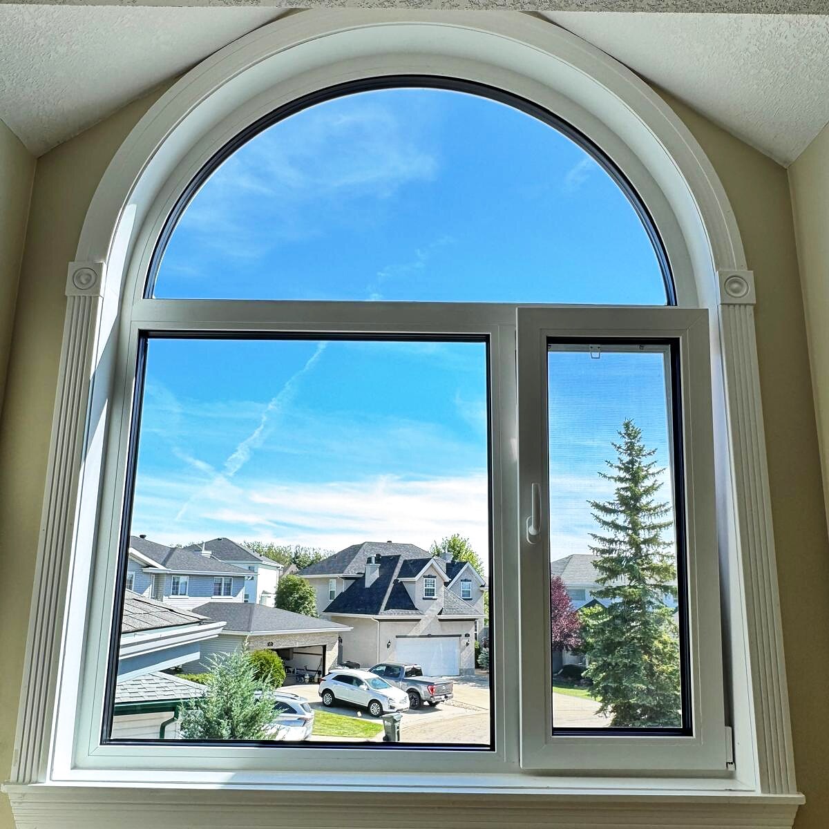Tilt-and-turn window with arched transom, interior view
